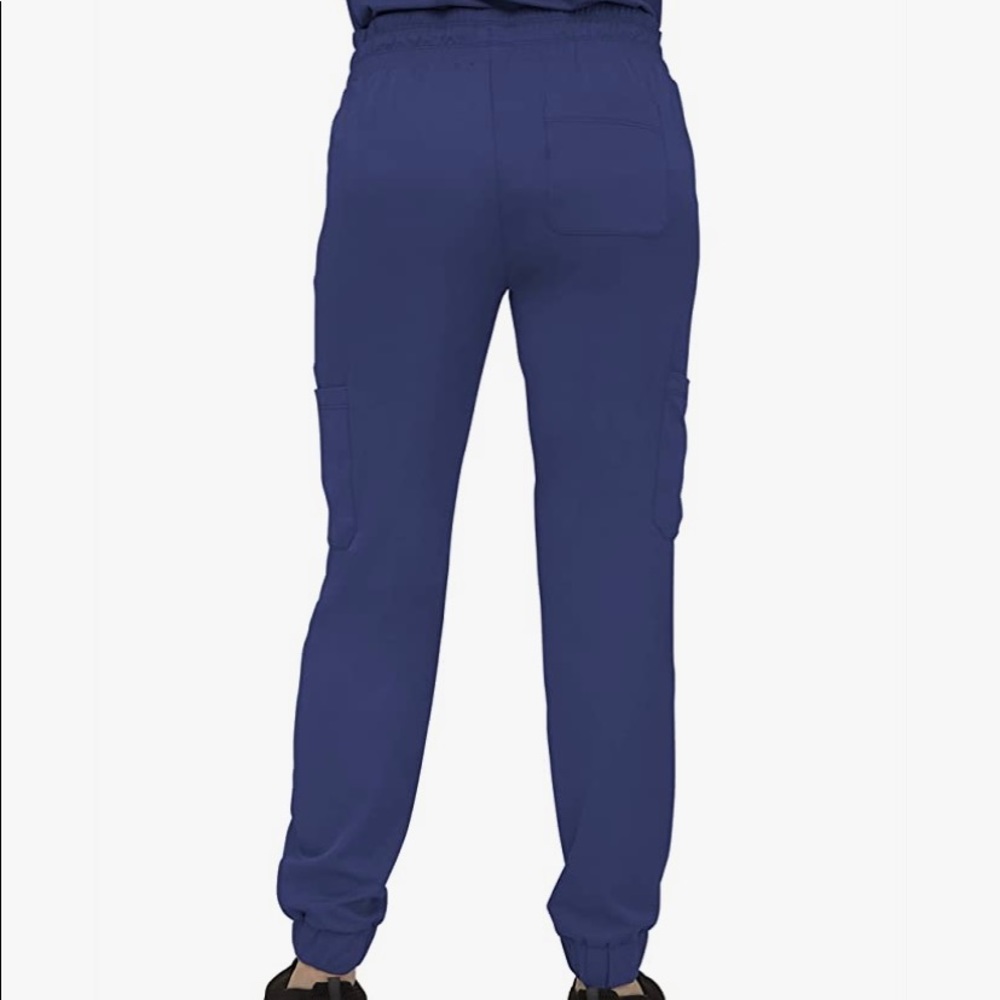 NWOT Soulful Scrubs women’s stretch scrub pants and three pocket scrub shirt.